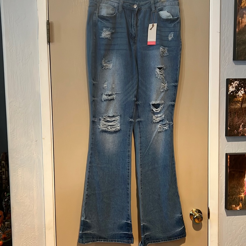 Light wash distressed flat Jean